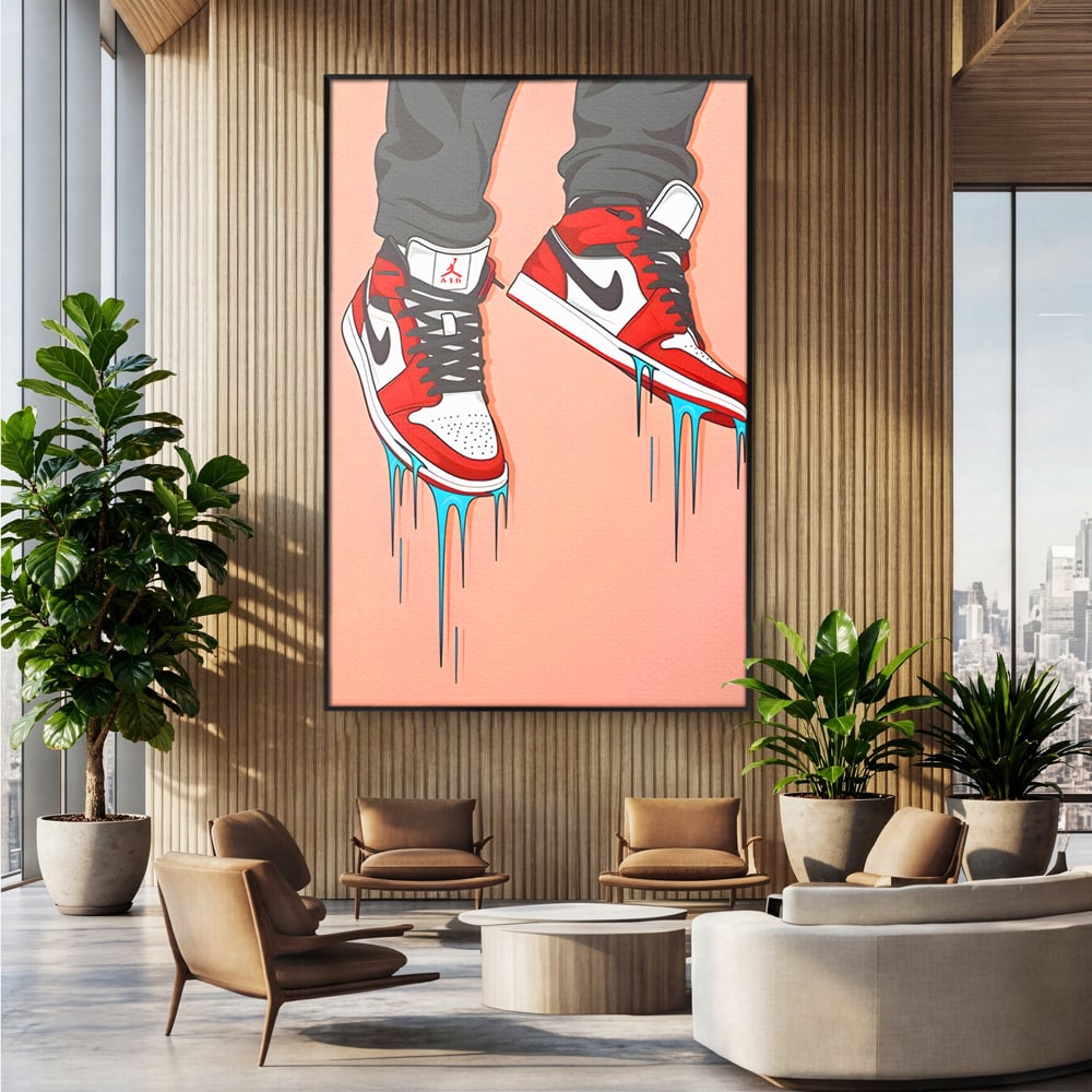 Tablou canvas cu ilustratie digitala cu adidasi rosii, in rama de aluminiu negru, pe perete intr-un birou